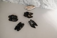 Kaboompics - Assorted Black and Brown Shoes in Minimal Flat Lay