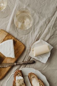 Kaboompics - Overhead Camembert, Butter, and Bread Lunch
