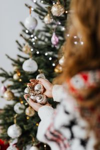 Kaboompics - Woman Presenting Christmas Ornaments