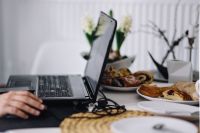 Kaboompics - Black Laptop and Cakes on a Table