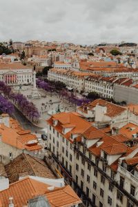 Kaboompics - Rossio Square, Lisbon Skyline and Purple Jacaranda Trees from Above