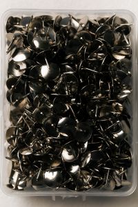 Kaboompics - Silver Thumbtacks in Clear Box