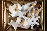 Kaboompics - White Christmas Ornaments in a Gold Wire Basket