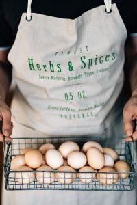 Wire mesh basket with fresh farm eggs