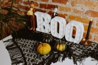 Kaboompics - Halloween BOO Marquee Sign with Pumpkins and Black Lace