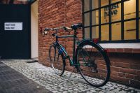 Kaboompics - Bicycle by the entrance to the gallery