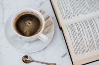 Kaboompics - Cup of Coffee and an Open Book