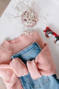 Kaboompics - Flat lay collage - women's modern casual outfit, pink sweater, jeans, sunglasses