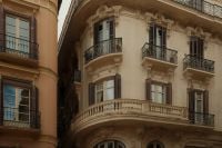 Kaboompics - Ornate Curved Balconies on Historic Malaga Building