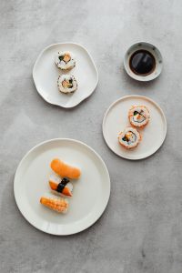 Kaboompics - Sushi Rolls with Soy Sauce in an Overhead Food Composition