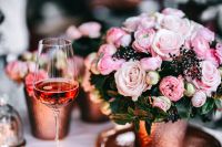 Kaboompics - Rose Wine Glass and Pink Flowers in Soft Focus