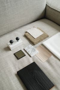 Kaboompics - Neutral Fabric Swatches Arranged on a Sofa