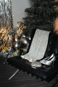 Kaboompics - Silver Glitter Chair with Party Decor and Christmas Tree