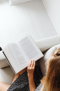 Kaboompics - Top View of Student Reading Book at Home