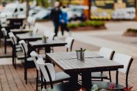 Kaboompics - Outdoor Café Terrace Tables with Potted Centerpiece at Manufaktura, Łódź, Poland