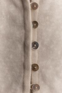 Kaboompics - Vertical Beige Knitwear With Natural Buttons