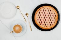 Kaboompics - Lattice-Top Blueberry Pie with Cappuccino on White Marble