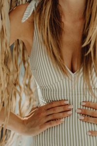 Kaboompics - Striped One-Piece Swimsuit Detail with Dried Grasses in Foreground