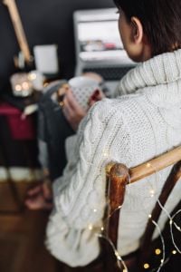 Kaboompics - Woman drinking hot tea in her home office