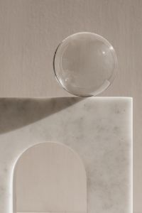 Kaboompics - Glass Spheres in Sunlit Marble Arch Still Life