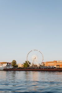 Kaboompics - Vertical Gdańsk Waterfront View with AmberSky Ferris Wheel and City Sign