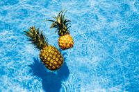 Kaboompics - Pineapple in a swimming pool