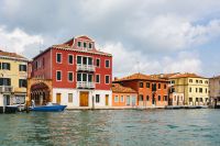 Kaboompics - Red Palazzo and Mooring Boats along a Colorful Murano Canal, Italy Travel Photography