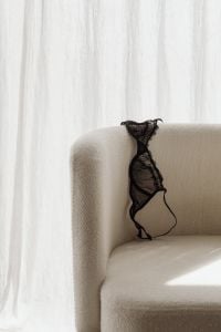 Kaboompics - Black Lace Bra Draped over a Chair