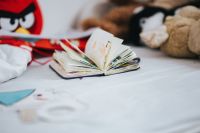 Kaboompics - Child's notebook and toys