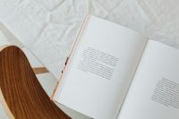 Kaboompics - Open Book Pages on a White Linen Table