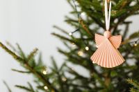 Kaboompics - Pink Paper Angel Ornament on a Christmas Tree