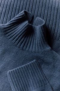 Kaboompics - Blue Turtleneck Sweater Texture for Winter Fashion Editorial