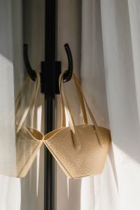 Kaboompics - Beige Leather Tote Bag by Sunlit Window