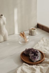 Kaboompics - Minimal Meditation Shelf With Torso Vase And Matchsticks
