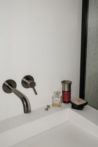 Kaboompics - Overhead Bathroom Skincare and Perfume Product Arrangement