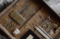 Kaboompics - Office accessories on an old wooden tray