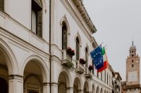 Kaboompics - Residential houses with arches & flags