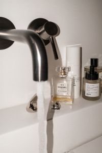 Kaboompics - Direct Flash Bathroom Still Life with Perfume and Soap