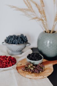 Kaboompics - Berry and Grape Still Life With a Dried Wheat Vase