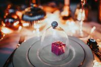 Kaboompics - Small Wrapped Gift under Glass Cloche on Christmas Plate