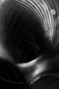 Kaboompics - Dark Metallic Coil Opening with Silver Highlights