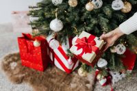 Kaboompics - Wrapped Christmas Gifts Beneath a Decorated Tree