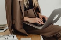 Kaboompics - Close-Up of Architect Working on Laptop in Business Attire