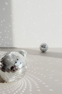 Kaboompics - Abstract New Year's Eve Background with Disco Ball Reflections and Spheres