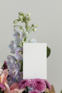 Kaboompics - Vertical Blank Card with Pale Blue Flowers on Light Floral Background