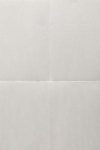 Kaboompics - Folded Off-White Paper with Horizontal and Vertical Creases