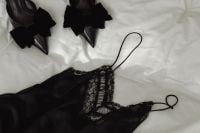 Kaboompics - Black Lace Lingerie and Satin Bows on White Bedding