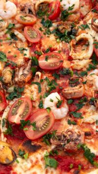 Kaboompics - Seafood Pizza With Shrimp, Calamari And Cherry Tomatoes