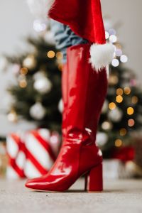 Kaboompics - Close-Up of Red Santa-Trimmed Boot with Christmas Bokeh