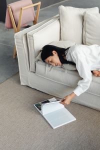 Kaboompics - Quiet Reading Moment on a Linen Sofa